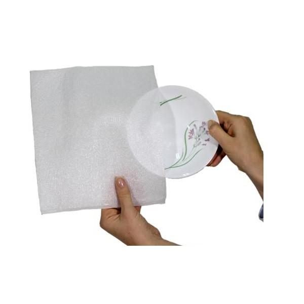 Plate being wrapped in EPE foam sheet